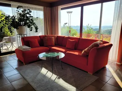 Ein Sitzbereich in der Unterkunft Komfort-Ferienwohnung Auf der Eulenburg