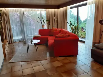 Ein Sitzbereich in der Unterkunft Komfort-Ferienwohnung Auf der Eulenburg