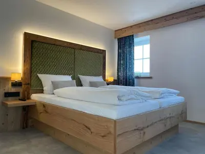 Ein Bett oder Betten in einem Zimmer der Unterkunft Hotel Gasthof zum Wulfen