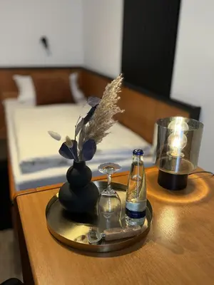 Ein Bett oder Betten in einem Zimmer der Unterkunft Hotel Gasthof zum Wulfen