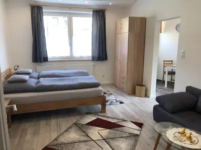 Ein Bett oder Betten in einem Zimmer der Unterkunft Ferienwohnung Alex