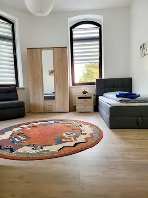 Ein Sitzbereich in der Unterkunft Ferienwohnung WESTEND