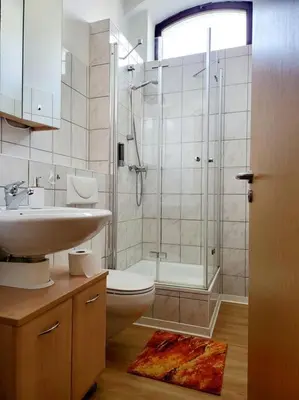 Ein Badezimmer in der Unterkunft Ferienwohnung WESTEND