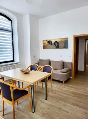 Ein Sitzbereich in der Unterkunft Ferienwohnung WESTEND