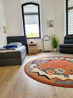 Ein Bett oder Betten in einem Zimmer der Unterkunft Ferienwohnung WESTEND