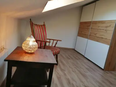 Ein Sitzbereich in der Unterkunft Ferienwohnung Saaleblick