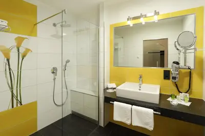 Ein Badezimmer in der Unterkunft Hotel Garni Schloß Schönberg