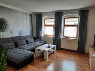Ein Sitzbereich in der Unterkunft NEU! Geschmackvolle FeWo Lengenfeld
