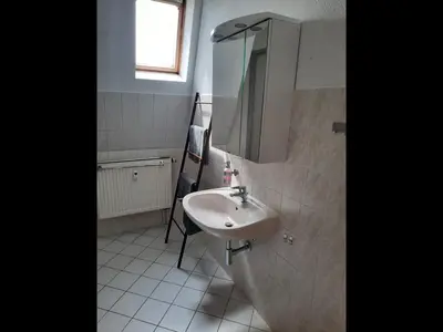 Ein Badezimmer in der Unterkunft NEU! Geschmackvolle FeWo Lengenfeld