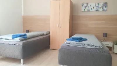 Ein Bett oder Betten in einem Zimmer der Unterkunft Ferienwohnung Vogtland