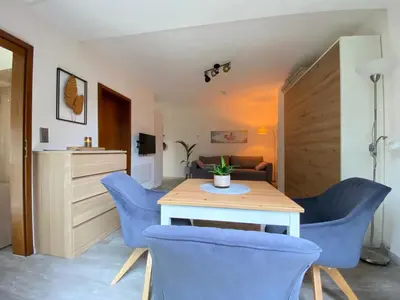 Ein Sitzbereich in der Unterkunft Ferienwohnung Sternenhimmel