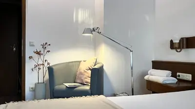 Ein Bett oder Betten in einem Zimmer der Unterkunft Unsereins Hotel