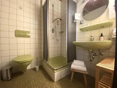 Ein Badezimmer in der Unterkunft Unsereins Hotel