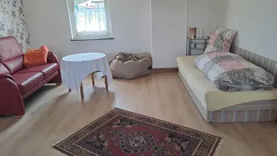 Ein Sitzbereich in der Unterkunft Keller´s Ferienwohnung an der Saale