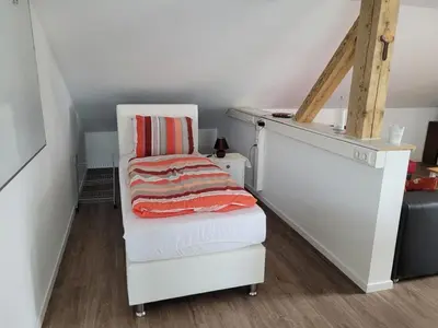 Ein Bett oder Betten in einem Zimmer der Unterkunft Ferienwohnung Schärl