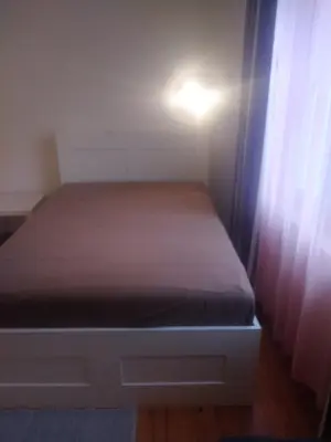 Ein Bett oder Betten in einem Zimmer der Unterkunft Zimmer nähe Festspielhaus/HBF