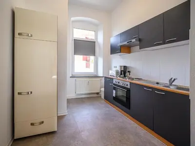 Küche/Küchenzeile in der Unterkunft Kleine, ruhig gelegene Ferienwohnung in Plauen