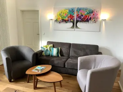 Ein Sitzbereich in der Unterkunft Das Logierhaus