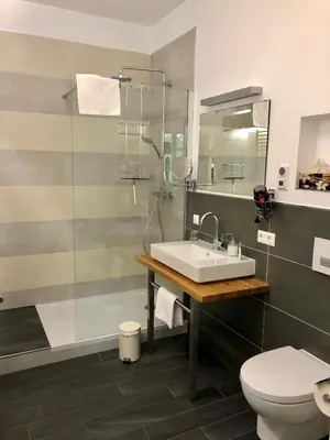 Ein Badezimmer in der Unterkunft Das Logierhaus