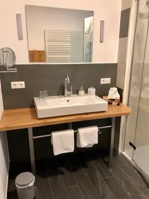Ein Badezimmer in der Unterkunft Das Logierhaus