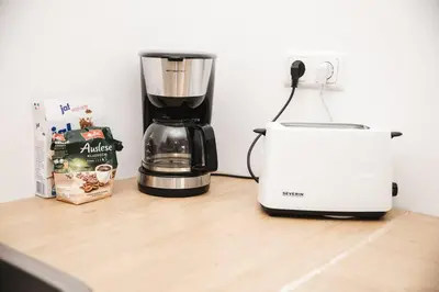 Kaffee-/Teezubehör in der Unterkunft Apartment mit Burgblick