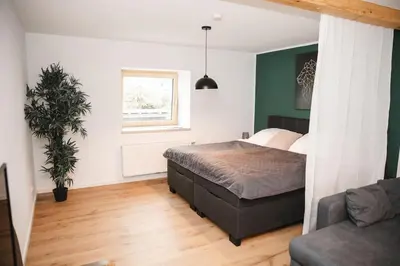 Ein Bett oder Betten in einem Zimmer der Unterkunft Apartment mit Burgblick