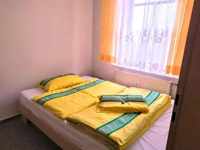Ein Bett oder Betten in einem Zimmer der Unterkunft Pension Stöß