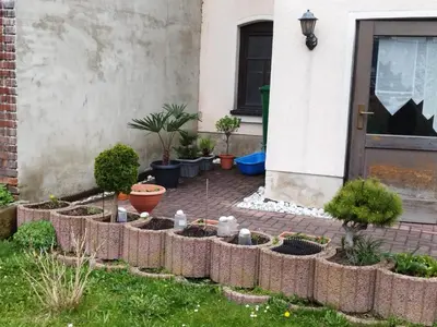 Ein Garten an der Unterkunft Pension Stöß