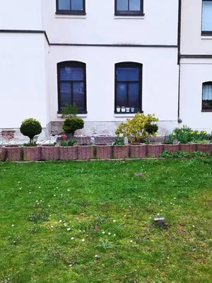 Ein Garten an der Unterkunft Pension Stöß