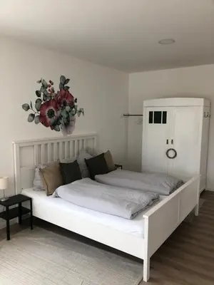 Ein Bett oder Betten in einem Zimmer der Unterkunft Ländliche Fewo Wildblume, 4 km zum Stausee