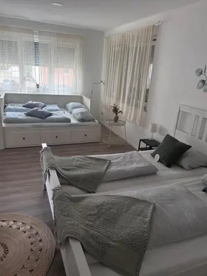 Ein Bett oder Betten in einem Zimmer der Unterkunft Ländliche Fewo Wildblume, 4 km zum Stausee