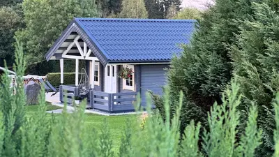 Ein Garten an der Unterkunft Häuslein Waldesruh