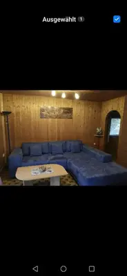 Ein Sitzbereich in der Unterkunft Ruhig gelegenes Ferienhaus