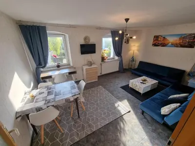 Ein Sitzbereich in der Unterkunft Ferienwohnung Kühnel