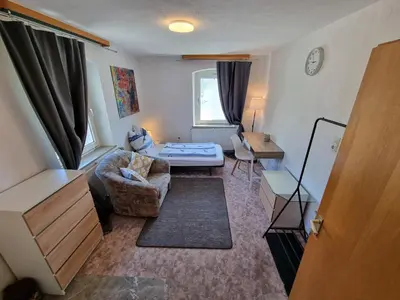 Ein Bett oder Betten in einem Zimmer der Unterkunft Ferienwohnung Kühnel