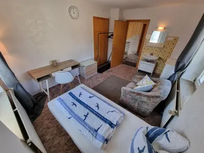 Ein Bett oder Betten in einem Zimmer der Unterkunft Ferienwohnung Kühnel