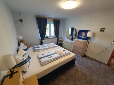 Ein Bett oder Betten in einem Zimmer der Unterkunft Ferienwohnung Kühnel