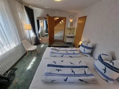 Ein Bett oder Betten in einem Zimmer der Unterkunft Ferienwohnung Kühnel