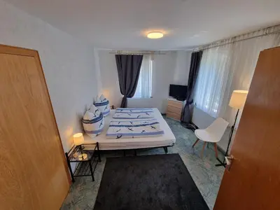 Ein Bett oder Betten in einem Zimmer der Unterkunft Ferienwohnung Kühnel
