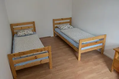 Ein Bett oder Betten in einem Zimmer der Unterkunft Ferienwohnung Otto