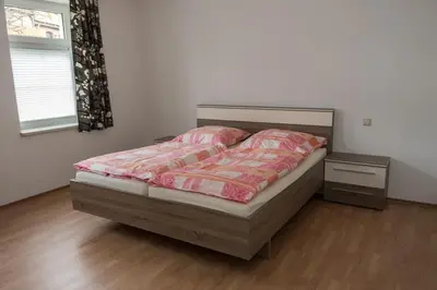 Ein Bett oder Betten in einem Zimmer der Unterkunft Ferienwohnung Otto