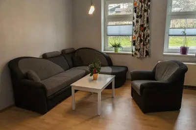 Ein Sitzbereich in der Unterkunft Ferienwohnung Otto
